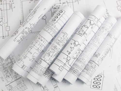 rolled engineering drawings and technical plans for infrastructure design