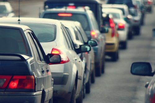 Cars in traffic being monitored by a CCTV traffic monitoring camera